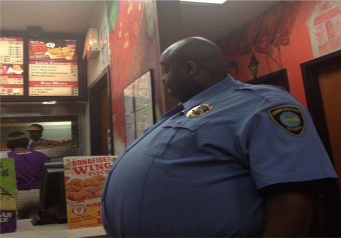 толстый полицейский